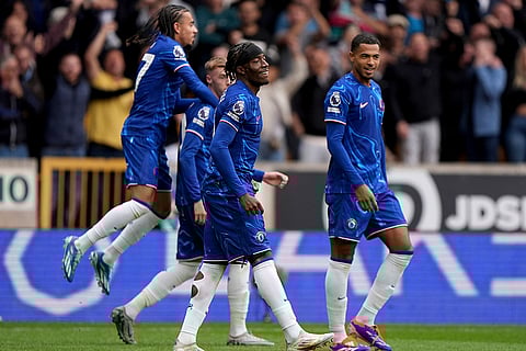 Premier League 2024-25: Chelsea's Noni Madueke, center, celebrates scoring against Wolves